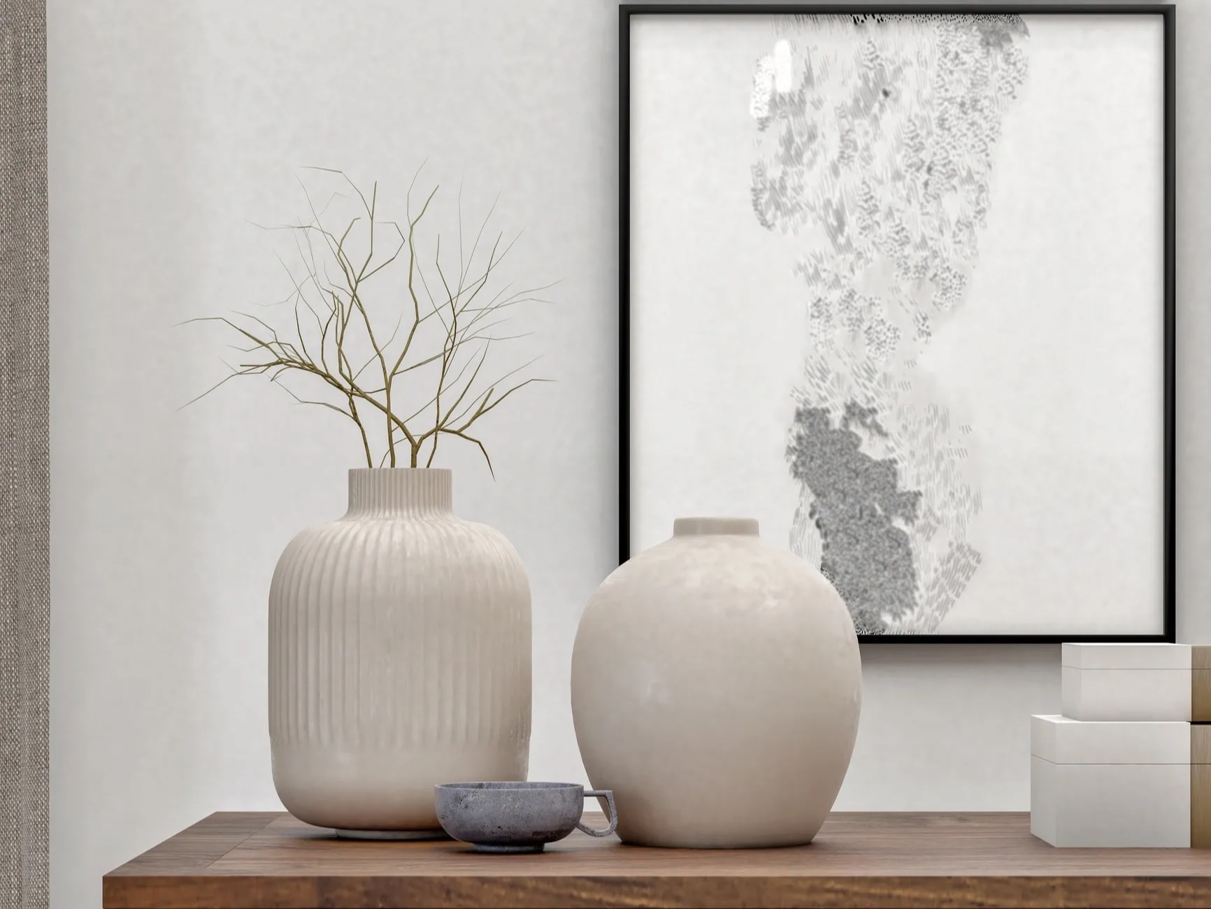 Shelf styling with ceramic vases and dried stems